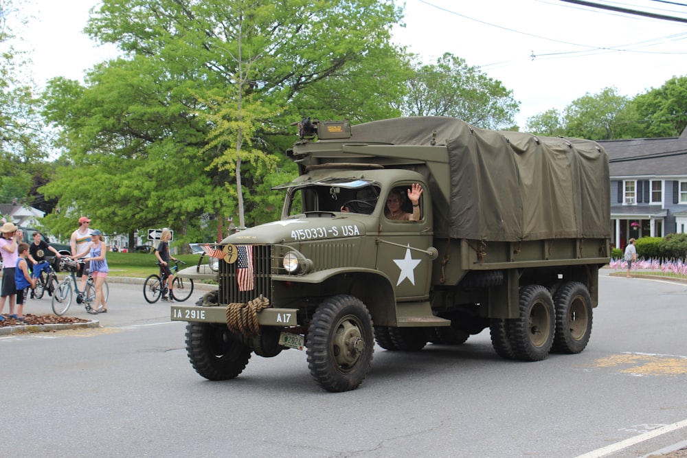 brown and green camouflage military tank