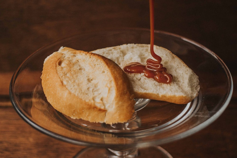 bread on clear glass plate