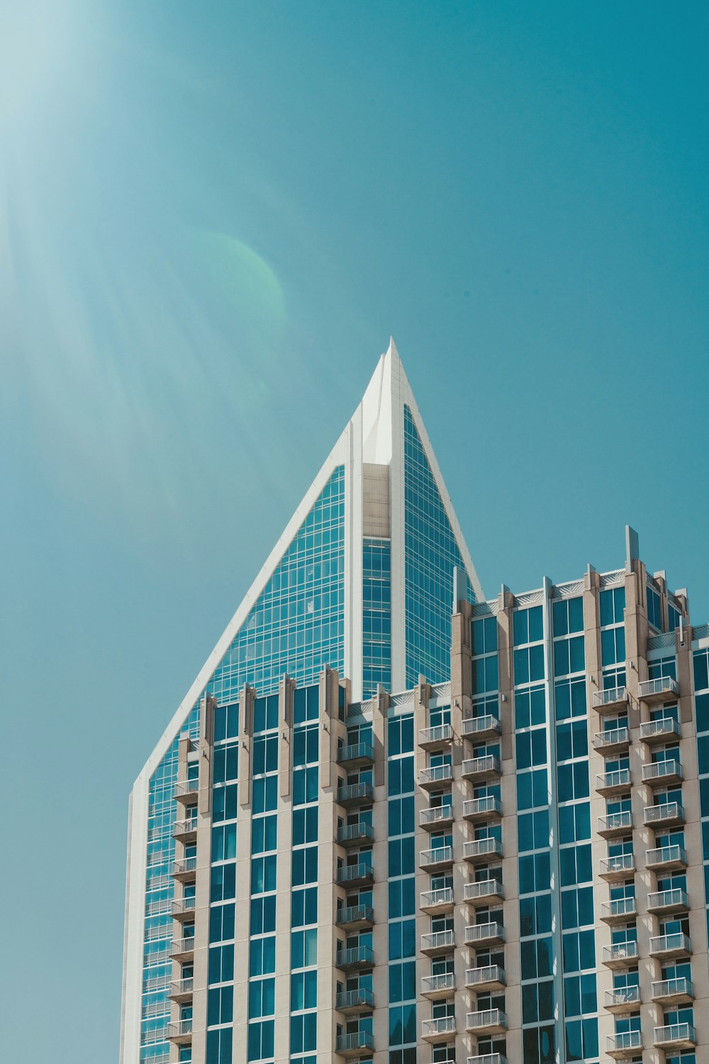 white and brown concrete building under blue sky during daytime