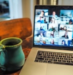 macbook pro displaying group of people