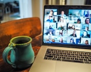 macbook pro displaying group of people