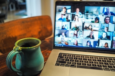 macbook pro displaying group of people