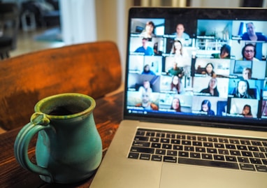 macbook pro displaying group of people