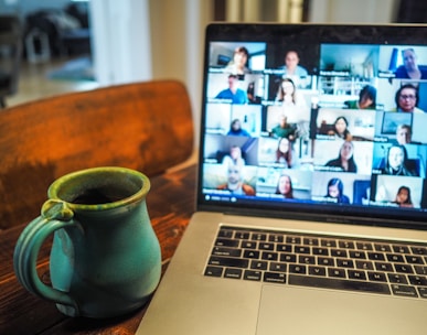 macbook pro displaying group of people