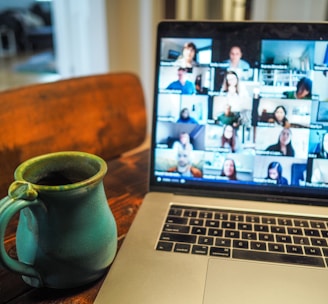 macbook pro displaying group of people