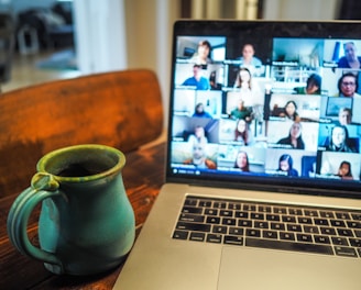 macbook pro displaying group of people