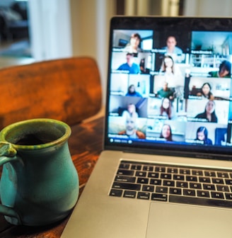 macbook pro displaying group of people