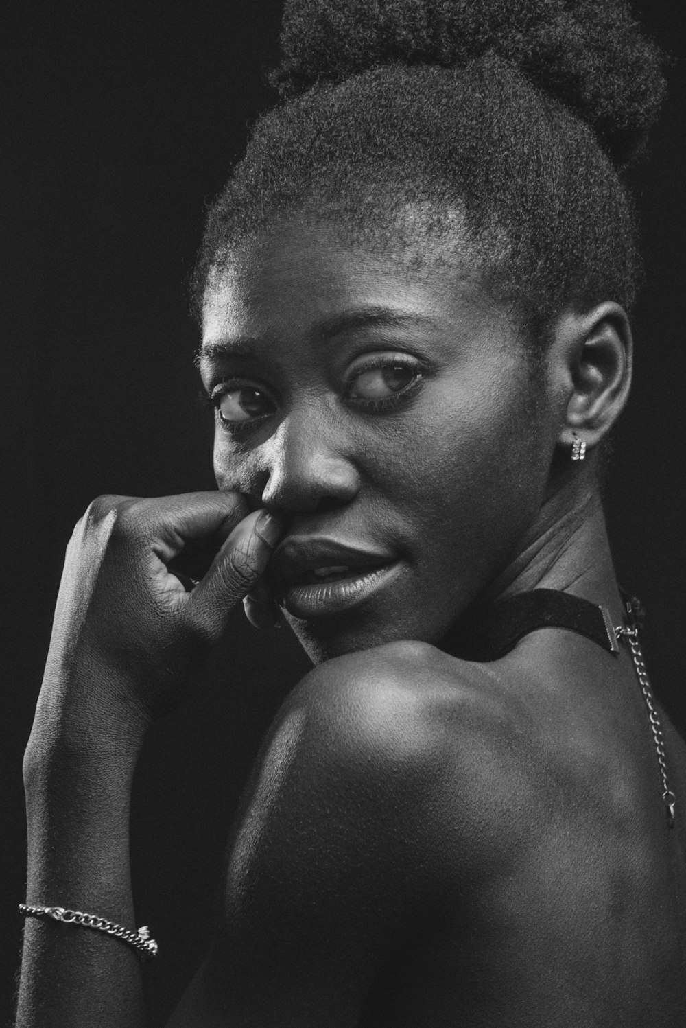 grayscale photo of woman wearing tank top