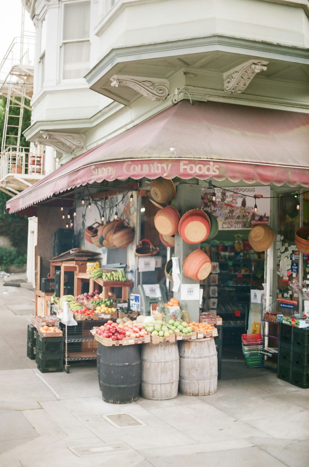 red and green balloons on store during daytime