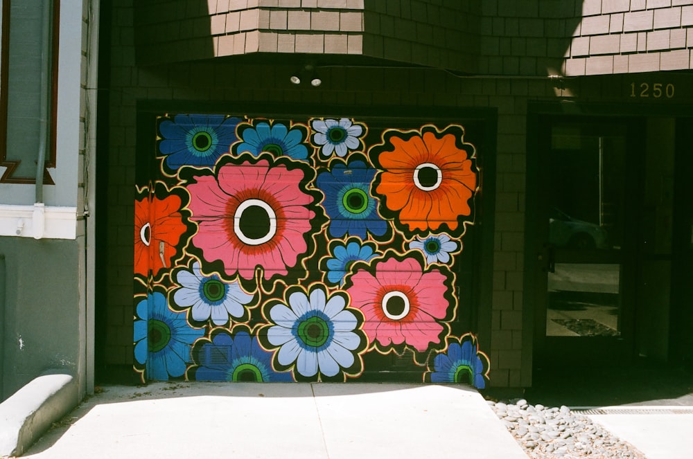 blue red and yellow floral textile