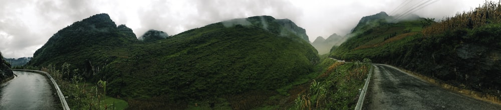 green mountain under white clouds during daytime