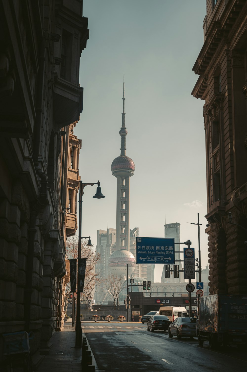 white concrete tower in the city during daytime