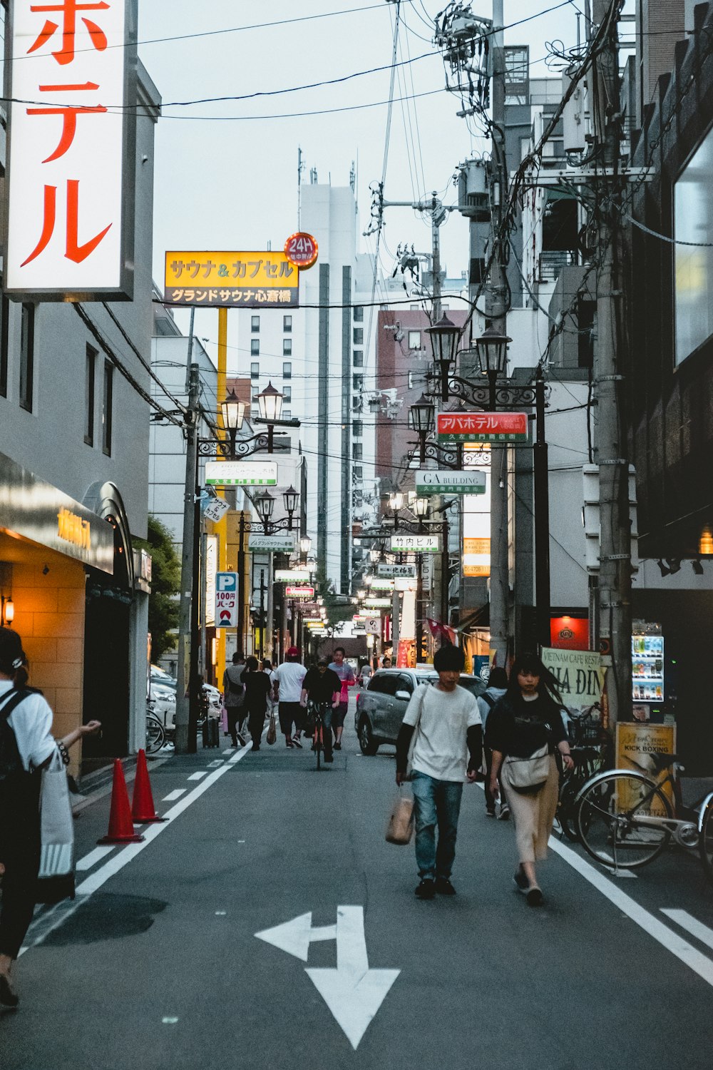 people walking on sidewalk during daytime