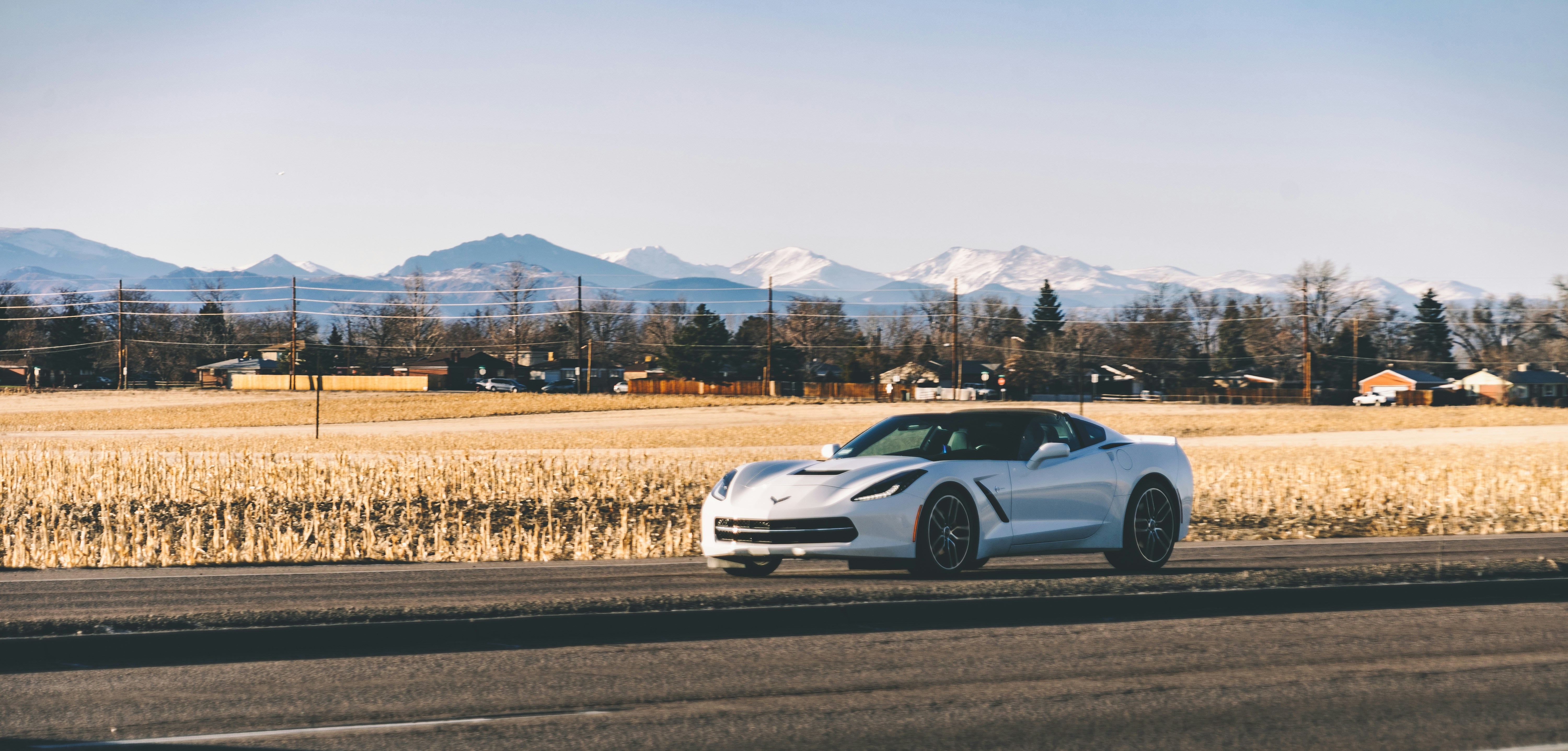 silver coupe on road during daytime
