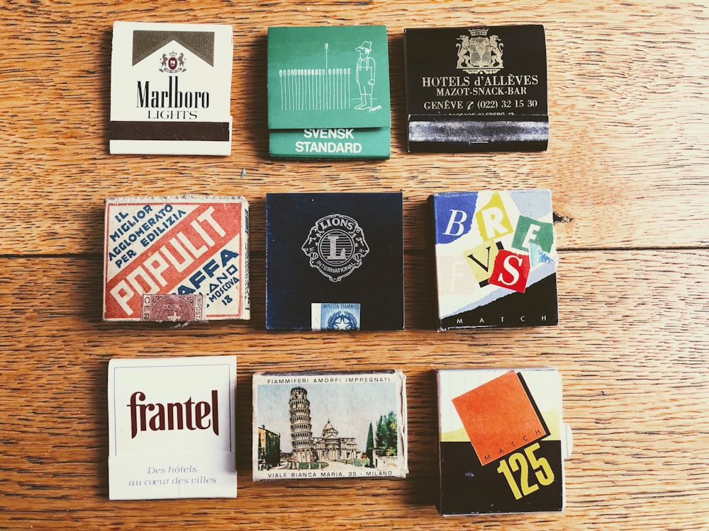 assorted cards on brown wooden table