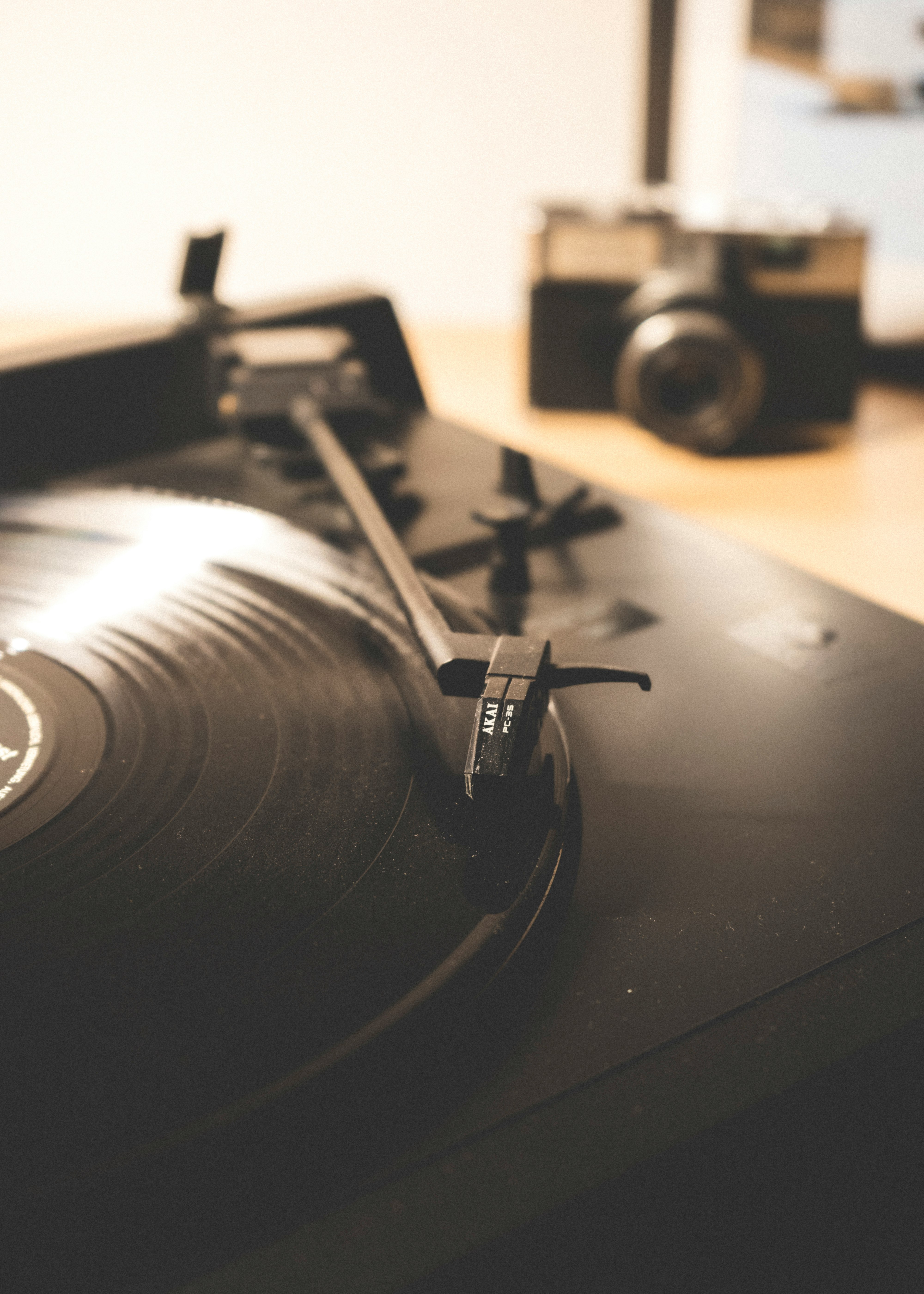 black vinyl record on vinyl record player