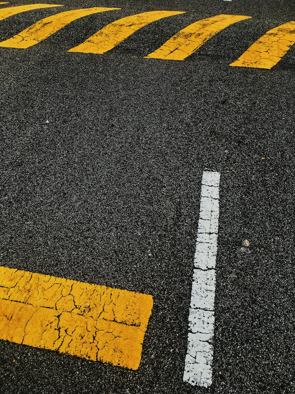 black and yellow pedestrian lane