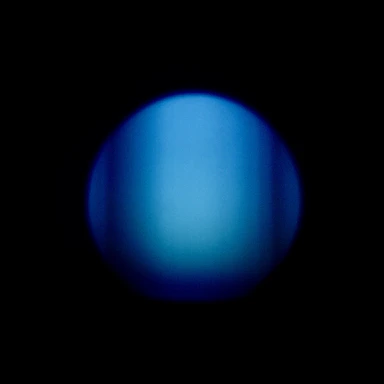 A soft light blue background with a circular light therapy patch glowing gently, surrounded by sun rays.