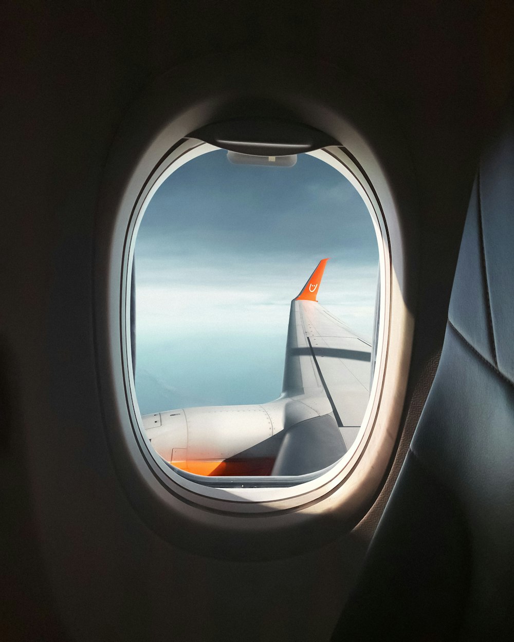 white and gray airplane window