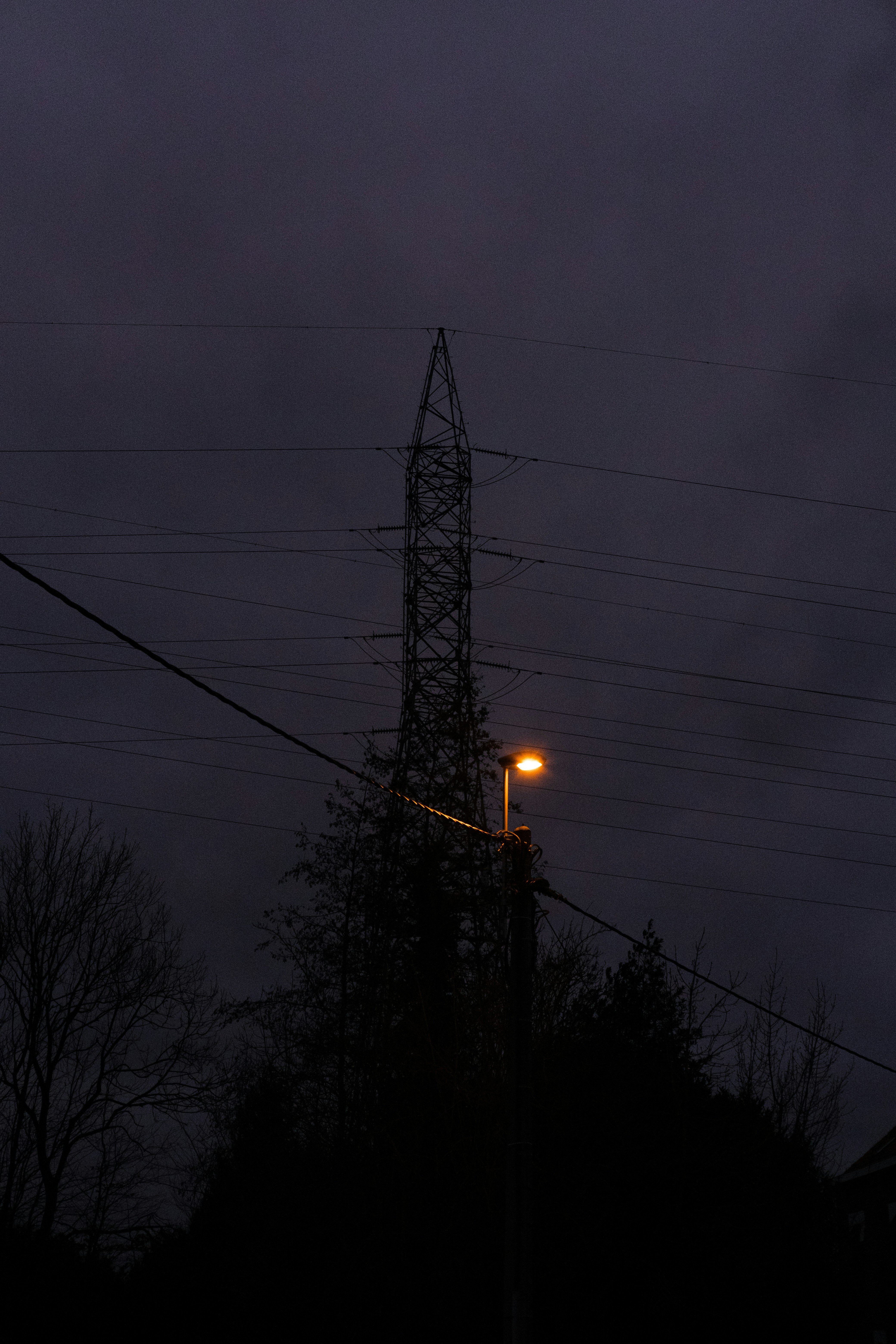 black electric post during night time
