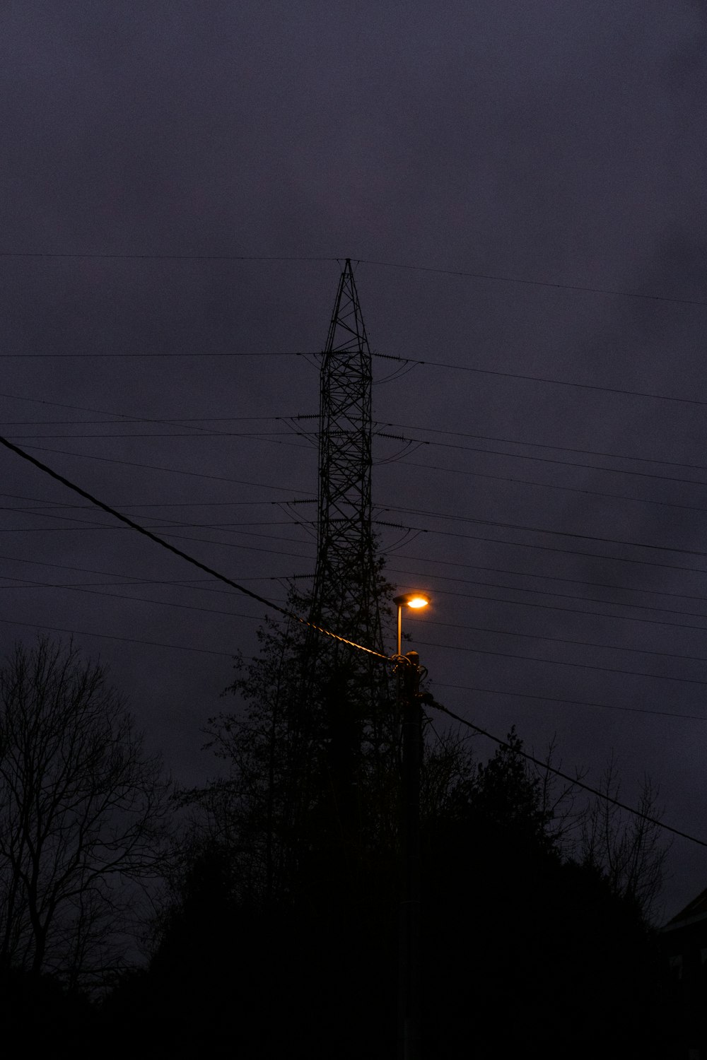 black electric post during night time