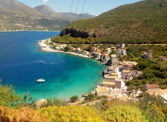 Aerial view of city near body of water during daytime — Karpathos, Greece