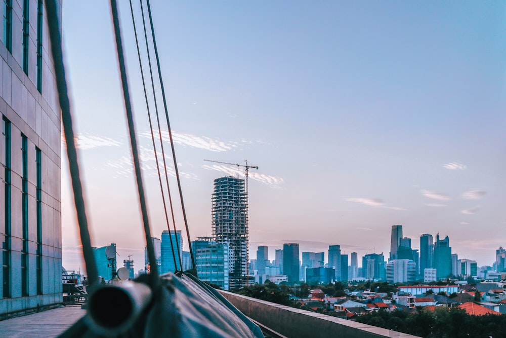 city skyline under blue sky during daytime