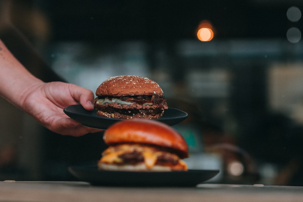 burger on black ceramic plate