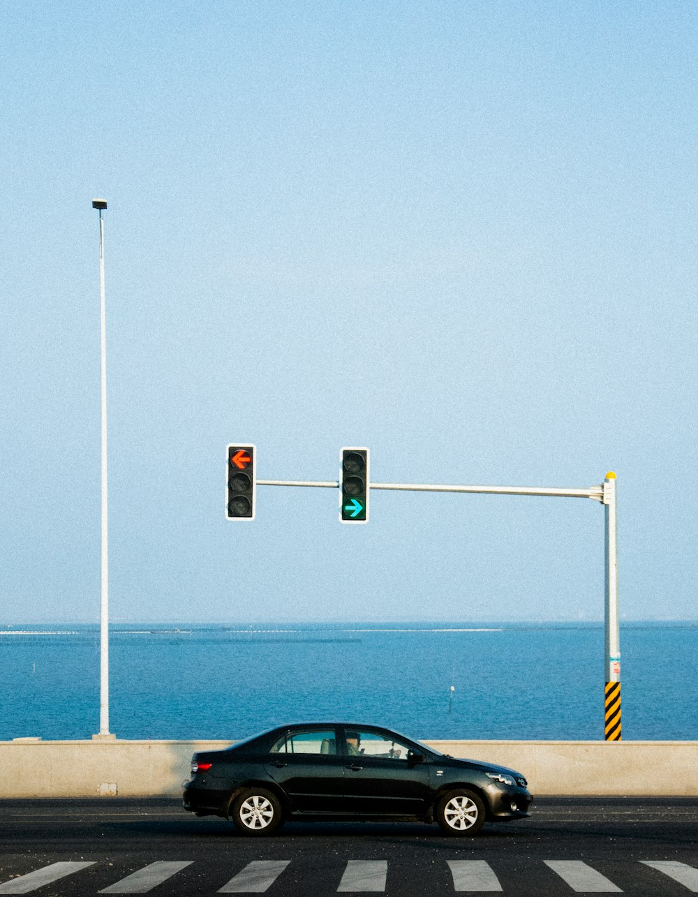 black car on road during daytime