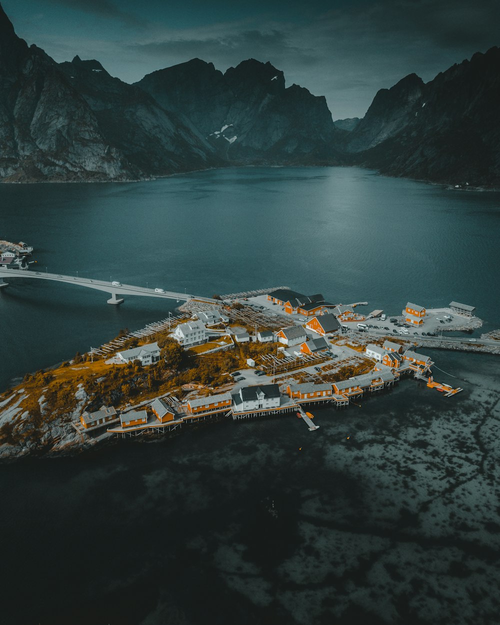 aerial view of city near body of water during daytime