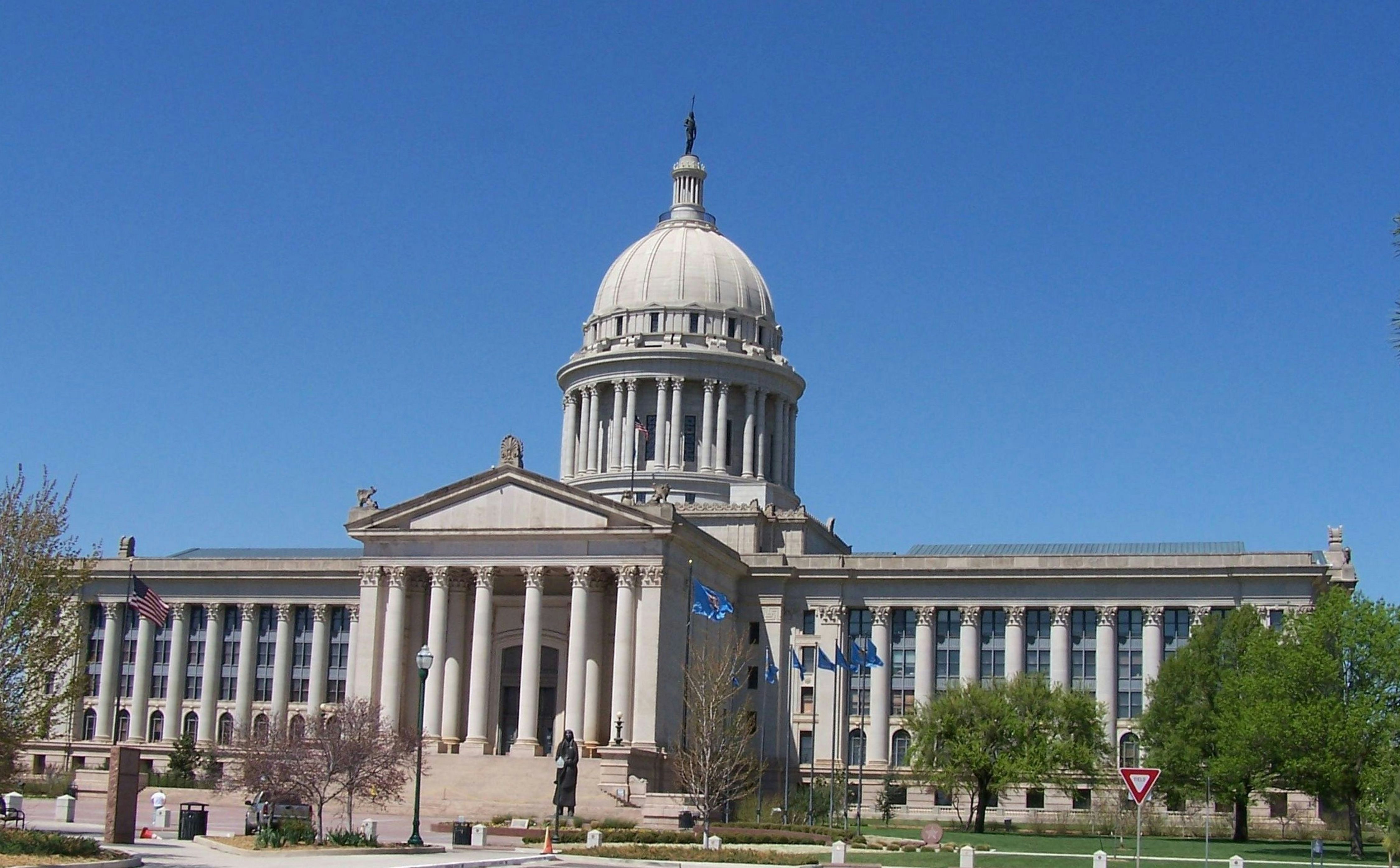 white concrete building under blue sky during daytime