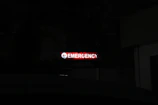 Picture of an emergency room entrance with clear signage and ambulance access.