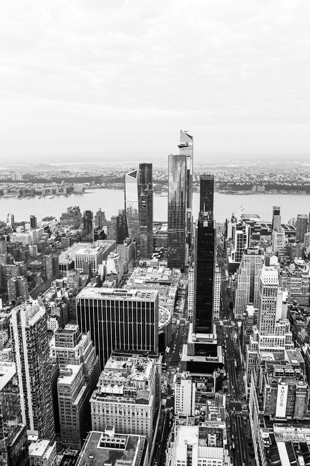 grayscale photo of city buildings