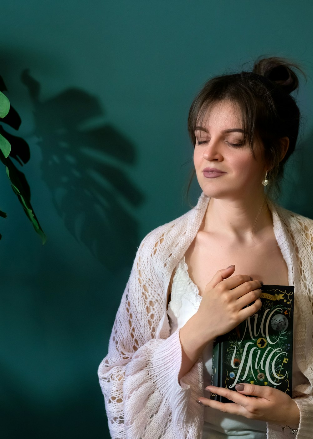 woman in white and blue floral scarf