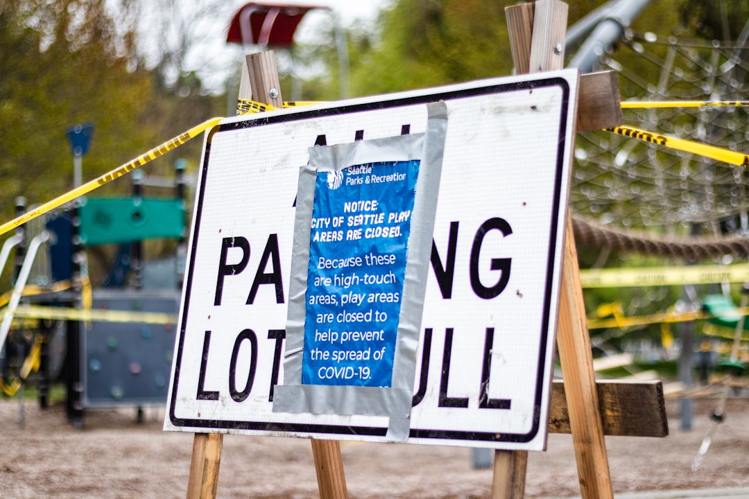 white and blue wooden signage