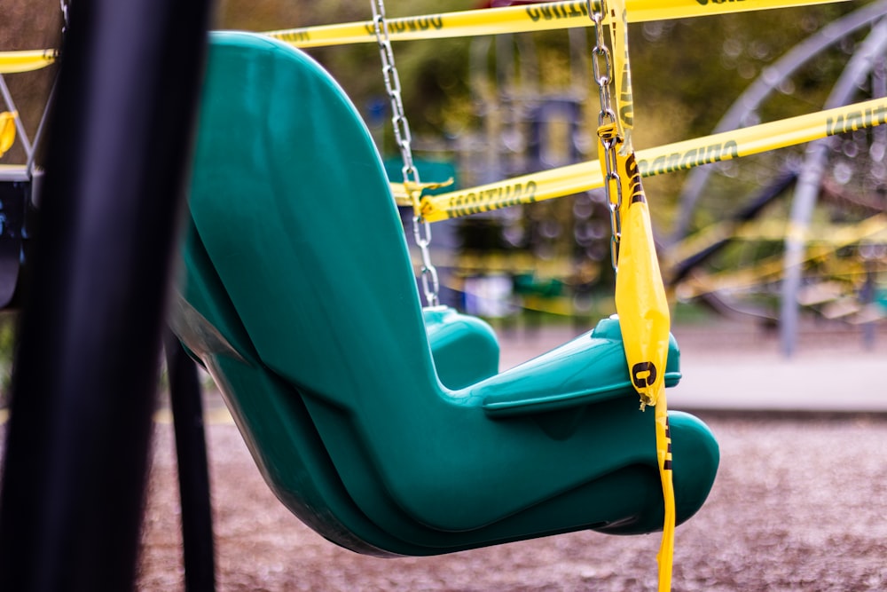 green and yellow swing chair