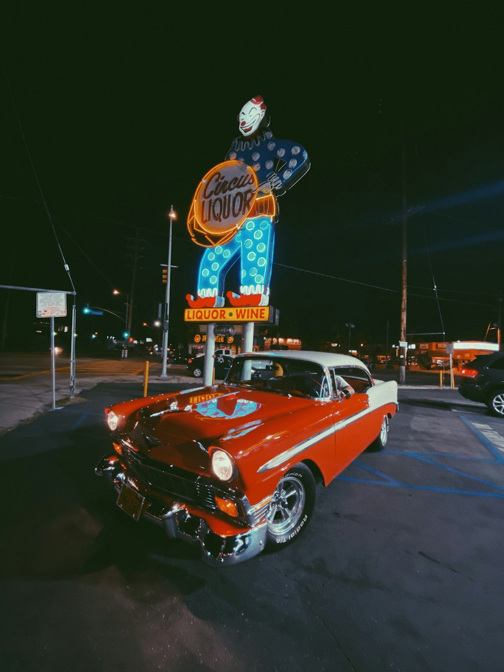 orange car on road during night time