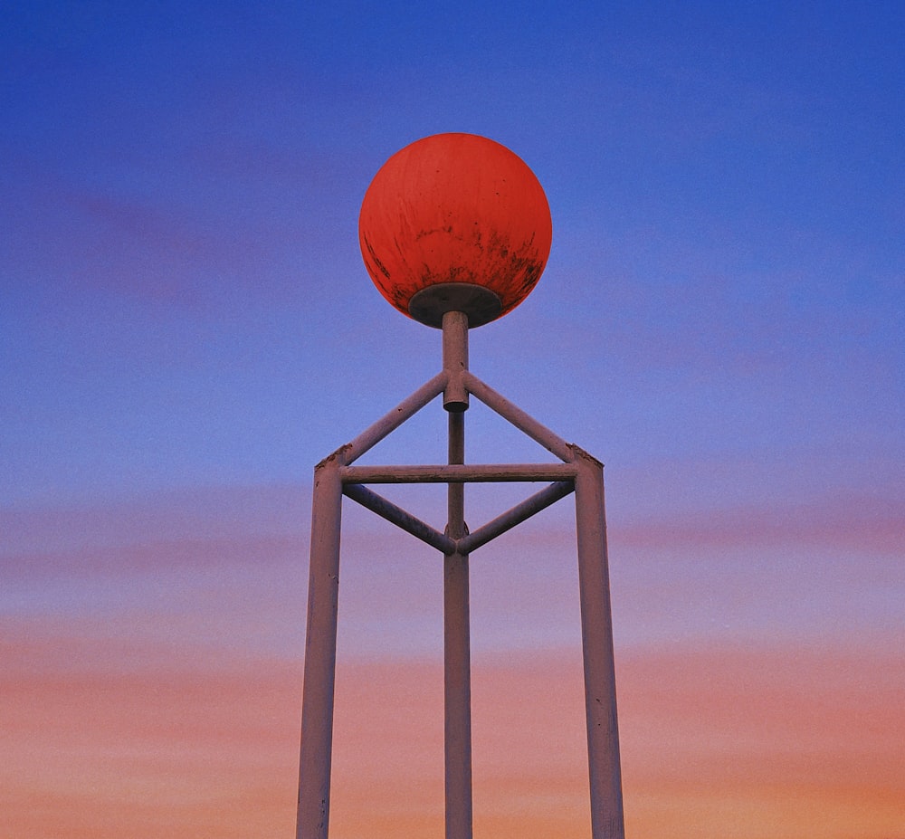 orange basketball on white wooden stand