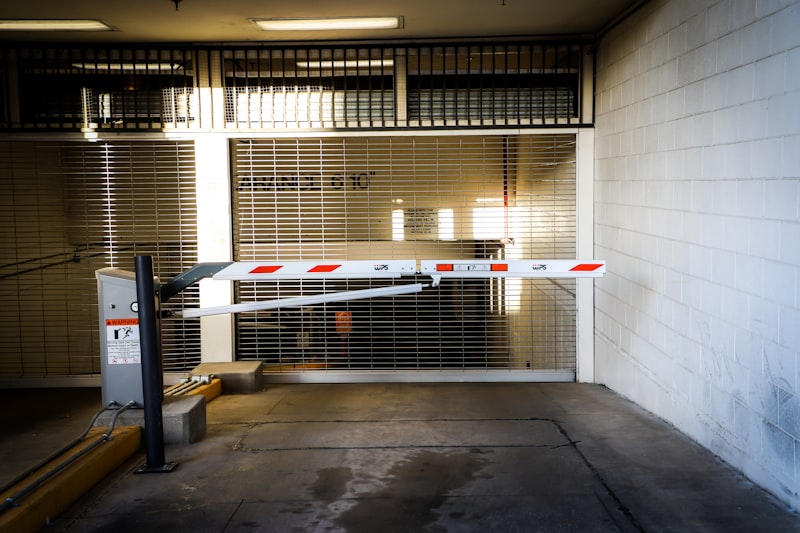 Automated vehicle barrier gate at parking entrance