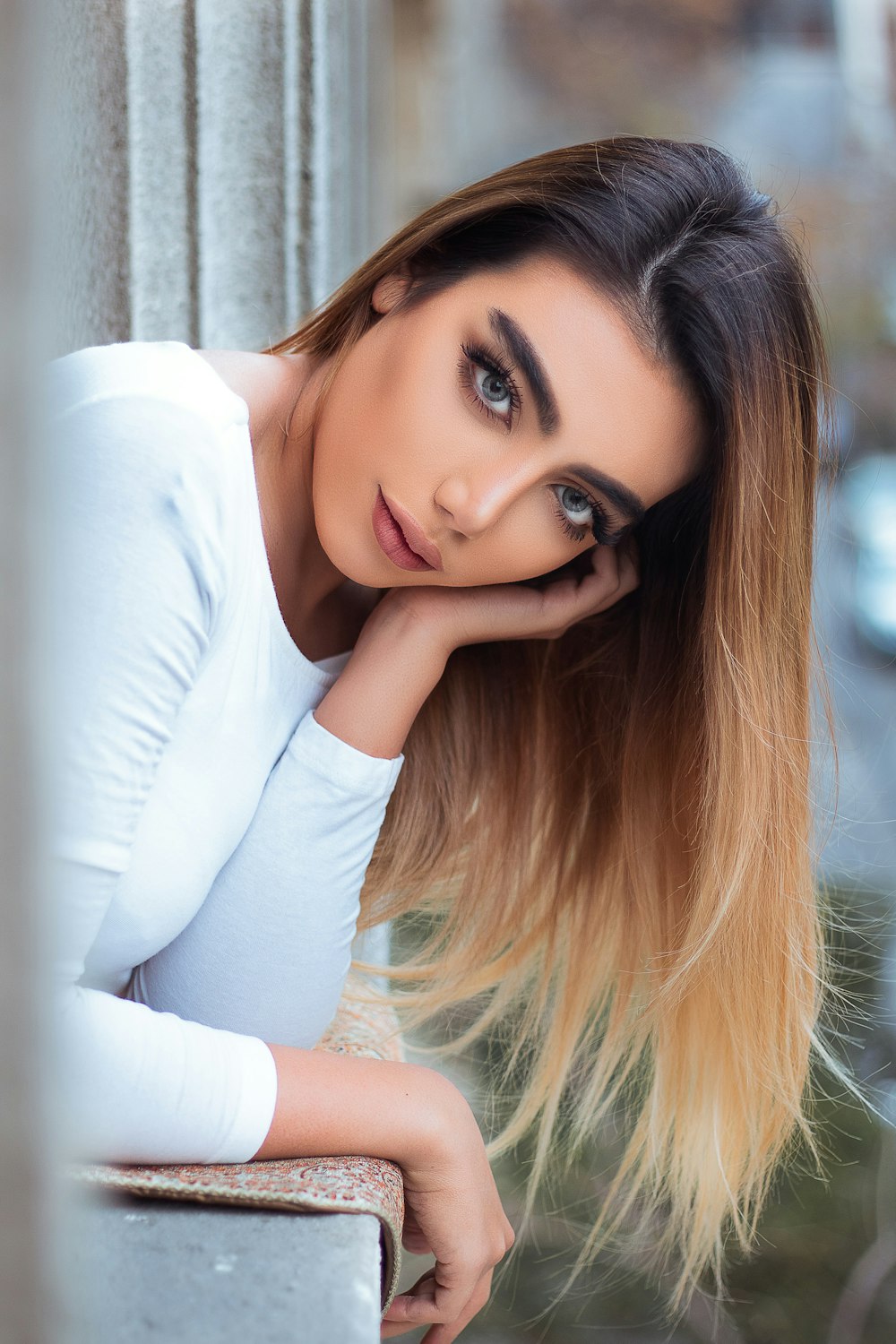 woman in white long sleeve shirt