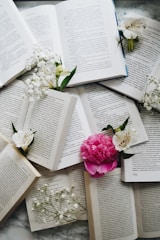 white and pink flowers on white printer paper