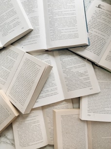 white printer paper on white table