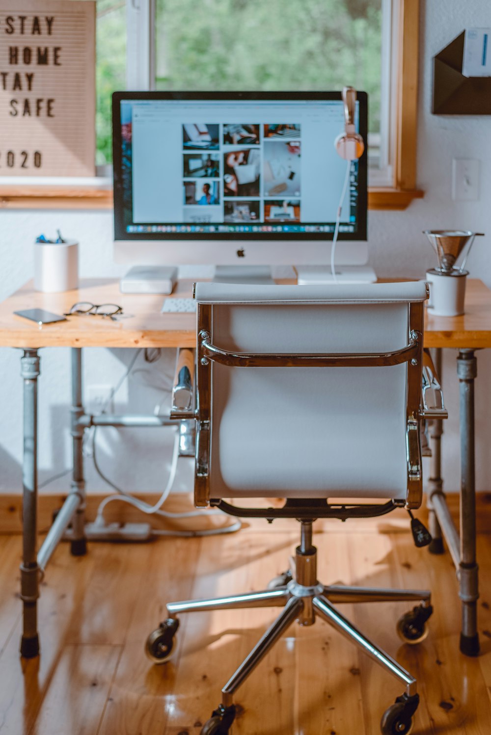 black flat screen tv on white and brown wooden table