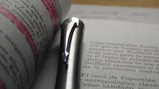 A close-up of a person highlighting text on a digital screen with annotation tools.