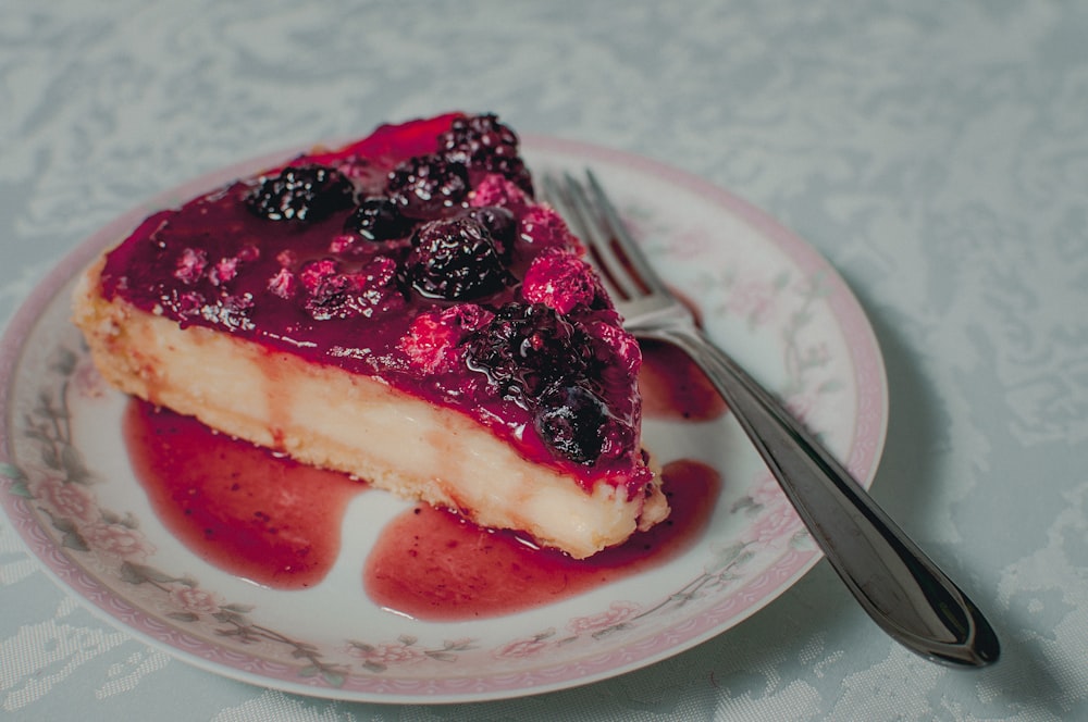 sliced cake on white ceramic plate