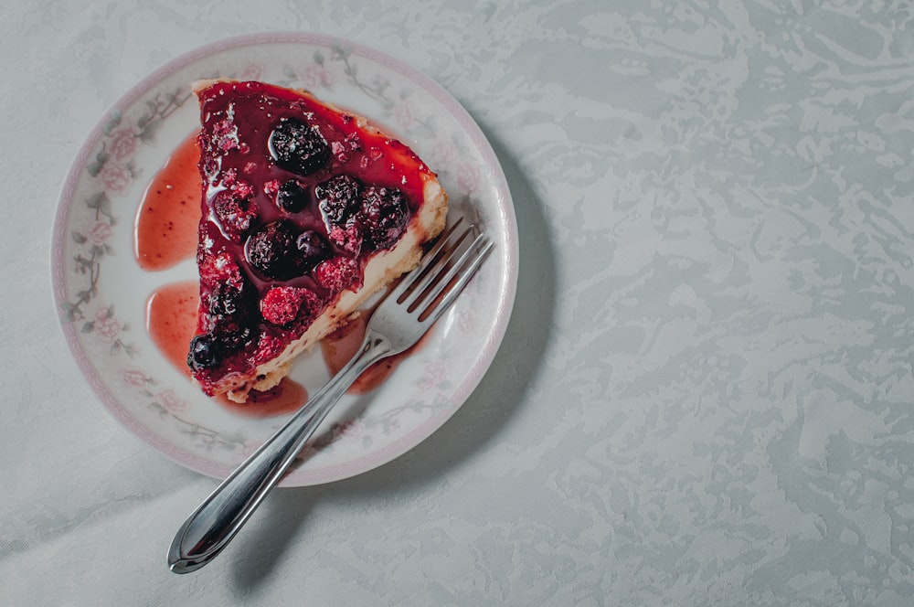 strawberry pie on white ceramic plate