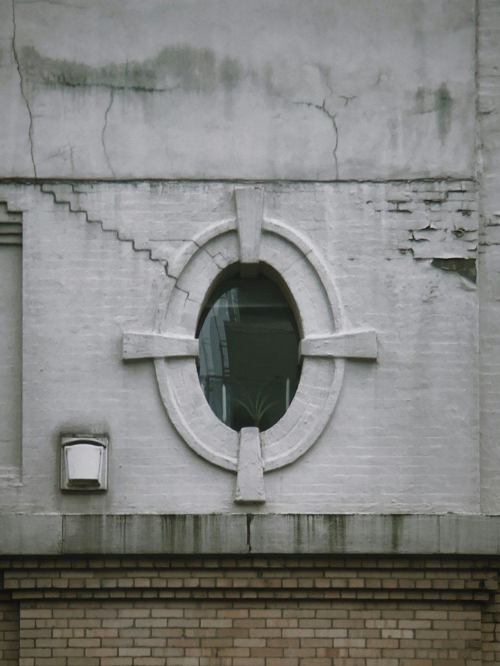 white concrete building with hole