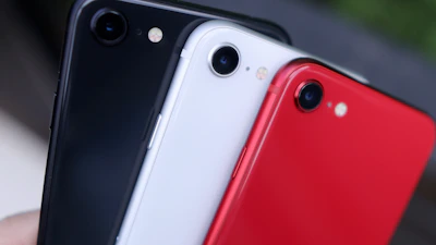 A lineup of Xiaomi Redmi phones showing different colors and sleek designs.