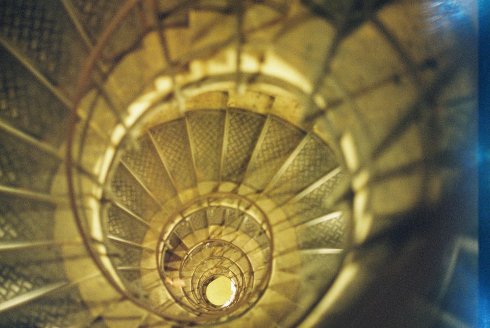 brown spiral staircase with white light
