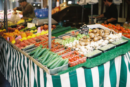 Close-up of fresh, colorful produce from local farmers displayed at a market stall.